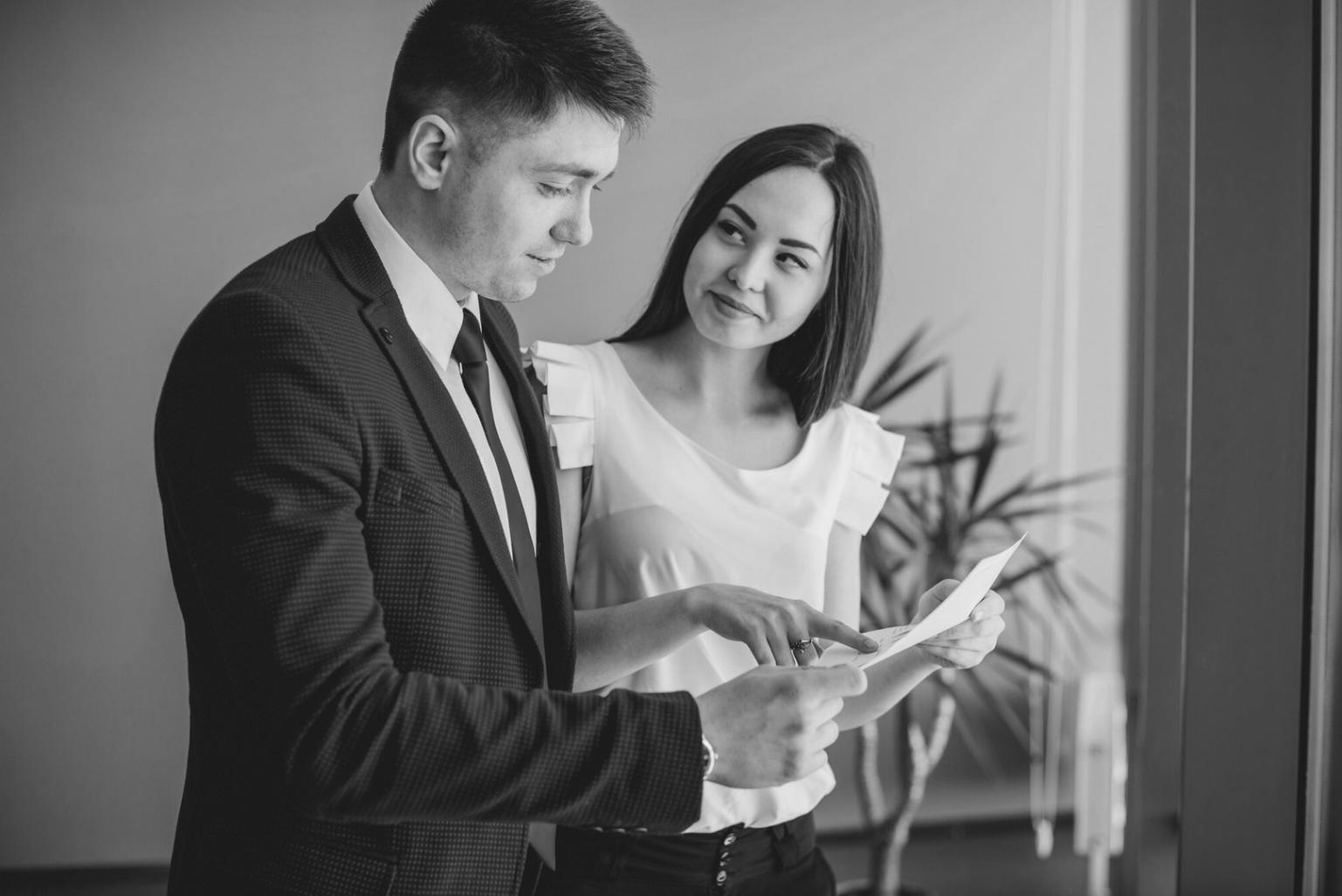 Business owner reviewing budget forecasts on laptop